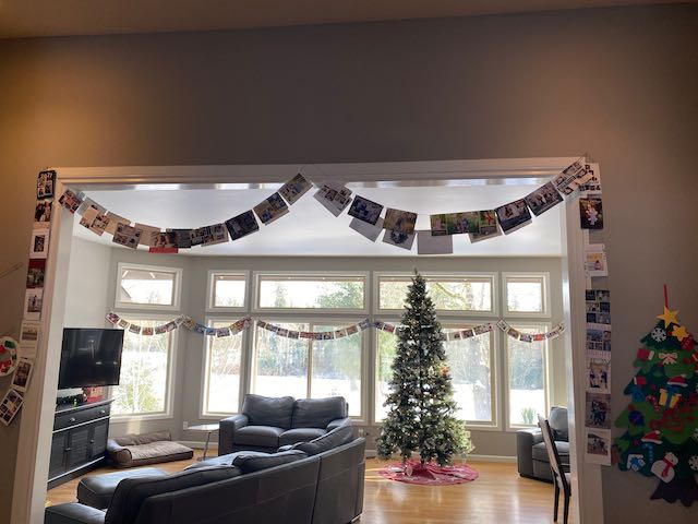 Holiday Card Garland example in a hallway.